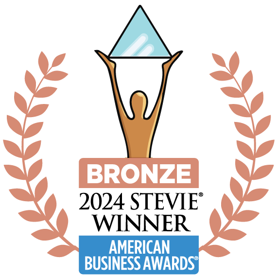 Bronze award badge from the American Business Awards featuring a trophy with a triangular top and laurel leaves, representing recognition for Blue Edge Business Solutions.